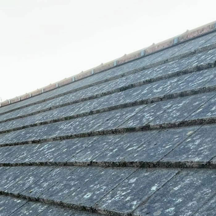 Pressure Washing Andy roof after scrape
